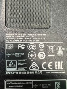 Etiqueta de especificaciones técnicas del modelo MSI MS-1799 con voltajes.