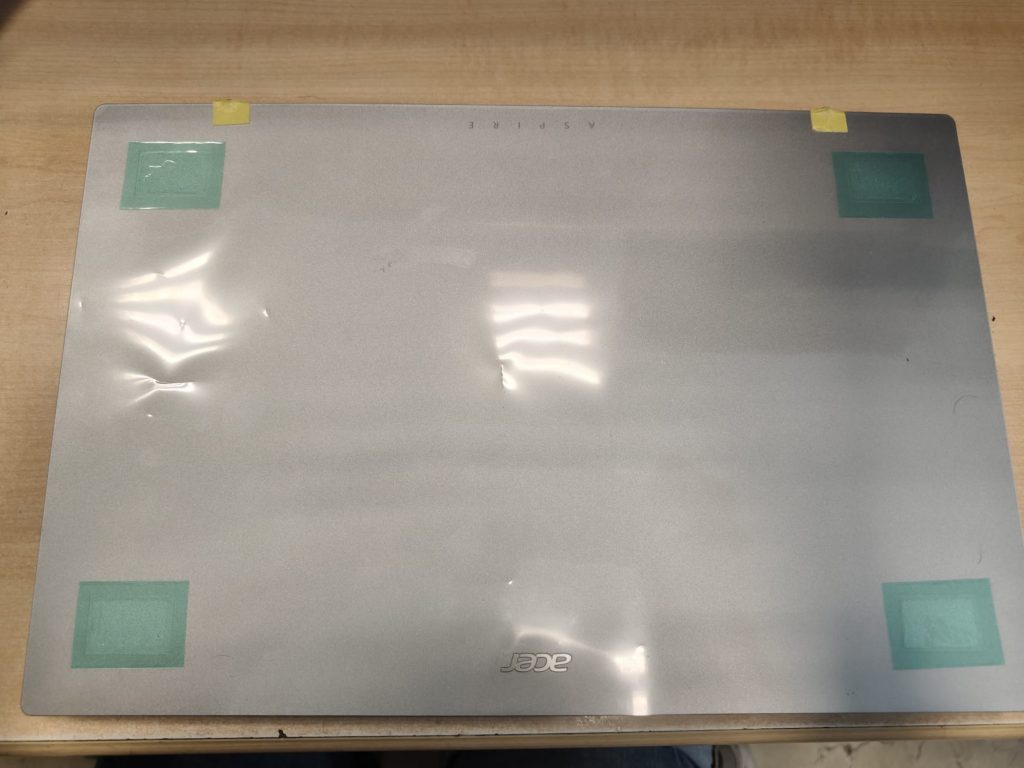 Tapa trasera (back cover) nueva color plata para Acer Aspire 3 15 lista para montaje.